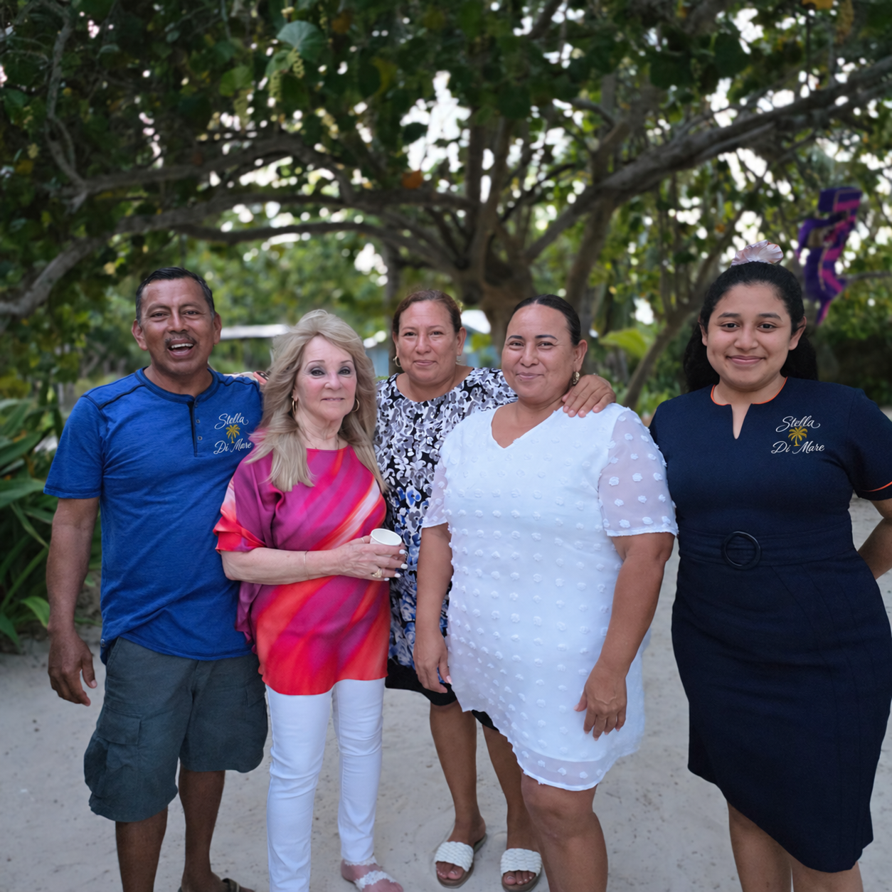 Five people together outdoors wearing Stella di Mare branded shirts